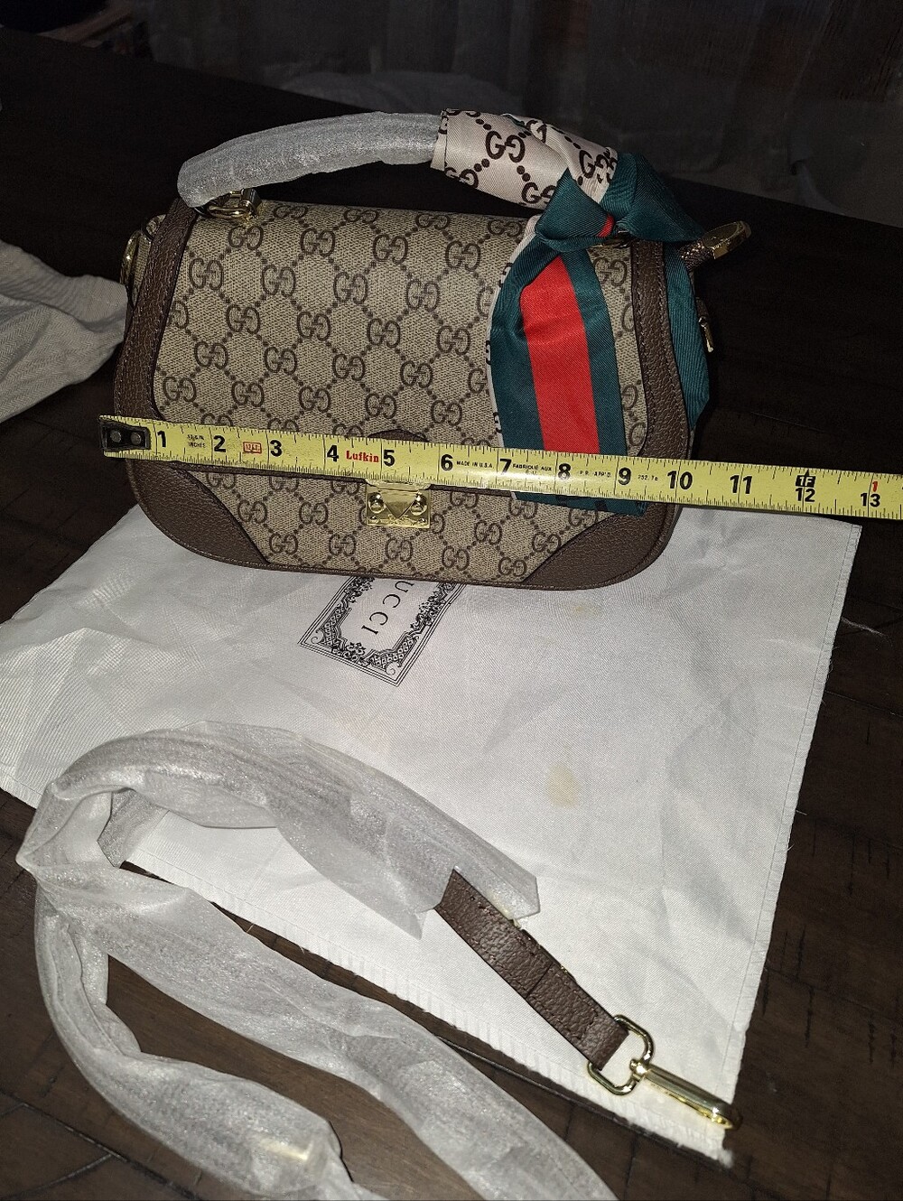 Beige Crossbody with Brown Trim and Green-Red Stripe Scarf